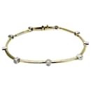 Pulseira charm Tiffany em platina e ouro amarelo - Tiffany & Co