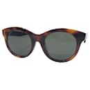 Óculos de sol de plástico Gucci GG entrelaçado