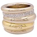 Pomellato ring, 'Tubolare', two golds and diamonds.