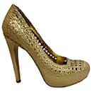 Prada golden intrecciato pumps