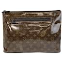 Louis Vuitton Monogram Pochette Cosmos Clutch
