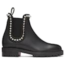 CHRISTIAN LOUBOUTIN black capahutta flat boots - Christian Louboutin