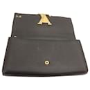 Louis Vuitton Capucines Wallet Black Leather