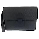 Louis Vuitton Monogram S Lock Leather Clutch M80582
