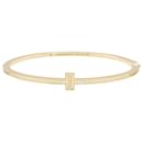 Bracelete Tiffany & Co., 'Tiffany T', ouro amarelo, diamantes.