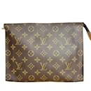 Bolsa Clutch Poche Toilette 26 Monograma Louis Vuitton