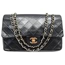 VINTAGE CHANEL CLASSIC TIMELESS MEDIUM 11.12 QUILTED LEATHER HANDBAG - Chanel