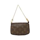 Acessório Mini Pochette Monogram Louis Vuitton