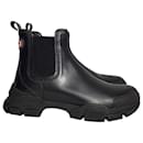 Gucci Leon Logo Lug Sole Chelsea Ankle Boots in Black Leather