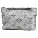 Louis Vuitton Reversible Pochette M68777