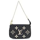 Mini Pochette Acessórios Bicolor Monograma Empreinte Louis Vuitton