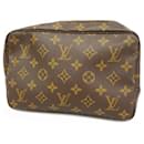 Pochete Monogram Louis Vuitton