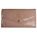 Carteira de couro rosa Louis Vuitton Metis