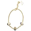 Louis Vuitton Charm Bracelet in Gold and Purple