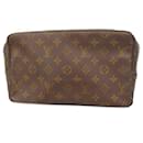 Pochete Monogram Louis Vuitton