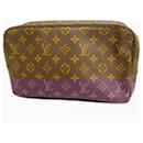 Pochete Monogram Louis Vuitton