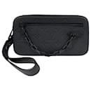 Louis Vuitton Pochette Volga Taurillon Monogram Clutch Bag