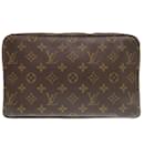 Bolsa Clutch Monogram True Toilet 28 da Louis Vuitton