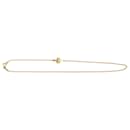 Pulseira de corrente dupla T em metal dourado da Tiffany & Co