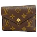 Portefeuille pliant Louis Vuitton