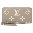 Portefeuille long Monogram Empreinte Louis Vuitton