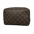 Pochete Monogram Louis Vuitton