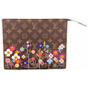 Pochete Monogram Louis Vuitton