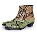 Saint Laurent, Lukas python ankle boots in beige