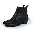 Saint Laurent, Cole 45 lizard effect Chelsea boots