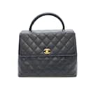 Chanel Caviar Skin Kelly Handbag Black Gold Hardware