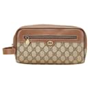 Gucci GG Supreme PVC clutch bag
