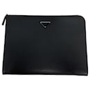  Prada Logo Plaque Zipped Clutch Bag in Black Leather