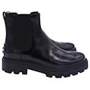 Tod's Logo-Embossed Chelsea Boots in Black Leather