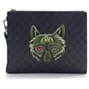 Gucci Supreme Wolf Clutch