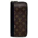 Louis Vuitton Macassar Vertical Zipper Wallet