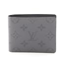 Louis Vuitton Portefeuille Slender Monogram Eclipse Reverse Bi-fold Wallet