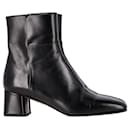 Aquazzura Sellier Ankle Bootie 50 in Black Leather