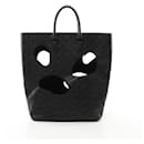 Louis Vuitton Monogram Empreinte Rei Kawakubo With Holes MM Tote Bag M58661