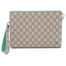 Gucci GG Supreme Coated Canvas Clutch Bag