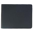 Louis Vuitton Taiga Bi-Fold Wallet