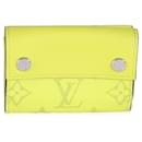 Louis Vuitton Yellow Tiagrama Discovery Compact Wallet