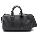 Louis Vuitton Leather Keepall XS Handbag