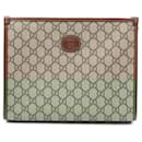 Gucci Interlocking G GG Supreme Clutch Bag