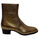 Saint Laurent Wyatt Ankle Boots in Gold Calf Leather