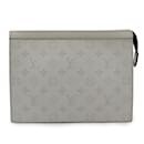 Louis Vuitton Taiga Rama Pochette Voyage MM Clutch