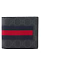 GUCCI - GG Supreme Gucci wallet in monogrammed coated canvas