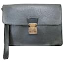 Louis Vuitton Clad Taiga Clutch Bag