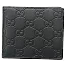 Gucci Guccissima Bi-Fold Leather Wallet