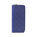 Louis Vuitton Taiga Llama Zippy Wallet