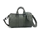 Louis Vuitton Monogram Seal Keepall XS Handbag